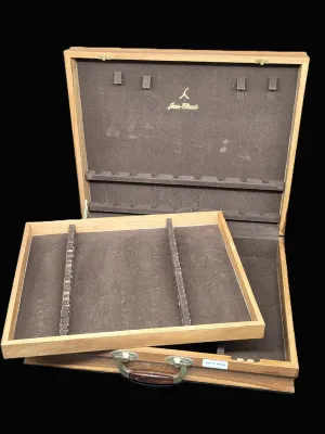 Vintage Jean-Claude wooden flatware storage chest with a removable tray, featuring a brown felt-lined interior and brass-toned hardware.