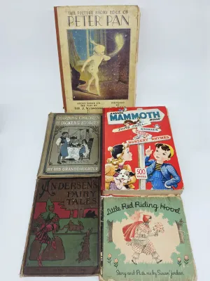 Collection of five vintage children's books, including "The Picture Story Book of Peter Pan," "Annual Mammoth...