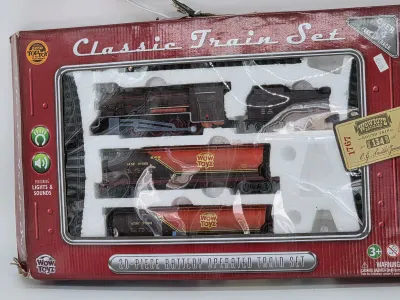 Wow Toyz Classic Train Set, a 20-piece battery-operated toy train set in its original box featuring lights and sounds.