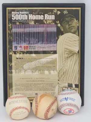 Framed Mickey Mantle 500th Home Run Kodak motion card display with certificate of authenticity, accompanied by three baseballs including...