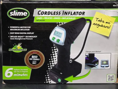 Slime brand cordless tire inflator, model 40057, in its original retail packaging.
