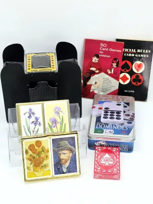 Vintage game night collection including an automatic card shuffler, Vincent van Gogh and floral themed playing cards, a set of...