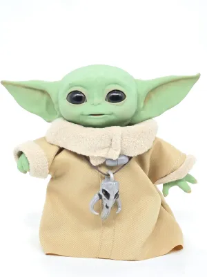 Star Wars Grogu "The Child" animatronic toy, featuring a fabric robe and a Mythosaur skull pendant necklace.