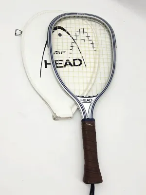 Vintage AMF Head Master aluminum racquetball racket with a brown leather grip and its original white zippered vinyl cover.