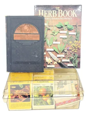 Vintage cookbook collection featuring a 1930s edition of 'The Household Searchlight Recipe Book', 'The Herb Book' by...