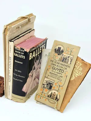 Collection of vintage books and booklets, including "Complete Book of Ballets" by Cyril W. Beaumont and "The...