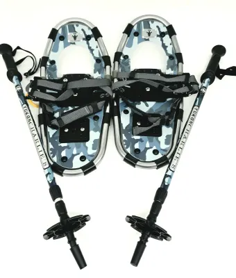 Yukon Charlie's snowshoes and matching trekking poles featuring a blue and grey camouflage pattern.