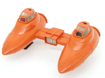 Vintage Kenner Star Wars Twin-Pod Cloud Car toy vehicle, circa 1980, featuring an orange plastic body with dual cockpits.