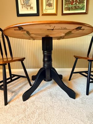 Round Pedestal Dining Table and Two Chairs