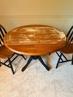 Round Pedestal Dining Table and Two Chairs
