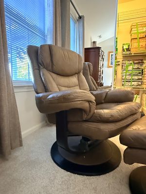 Lane Leather Swivel Recliner and Ottoman