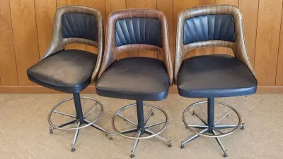 MID-CENTURY SWIVEL BAR STOOLS