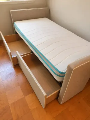 UPHOLSTERED TWIN BED WITH STORAGE 