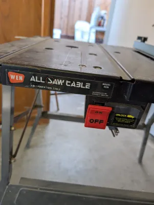 Vintage Wen All Saw Table, Model 4535, featuring a 3-in-1 power tool table design with a prominent red on/off safety switch.