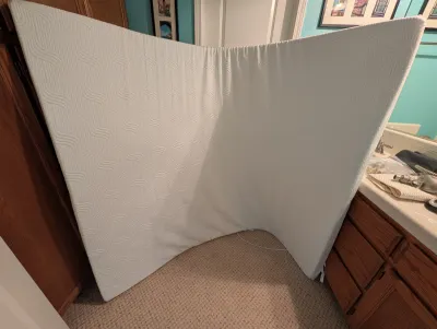 White textured mattress topper.