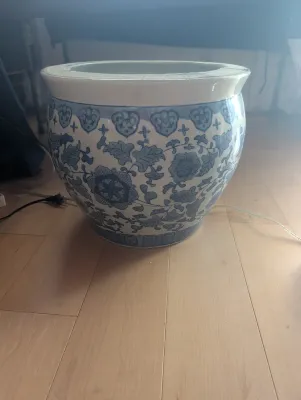Large Chinese blue and white porcelain fish bowl planter, featuring a traditional floral and vine motif.