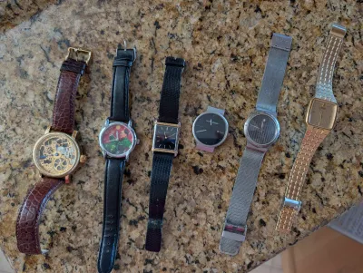 Collection of six vintage and modern wristwatches, including a skeleton dial watch with a brown leather strap, a Mao Zedong novelty...
