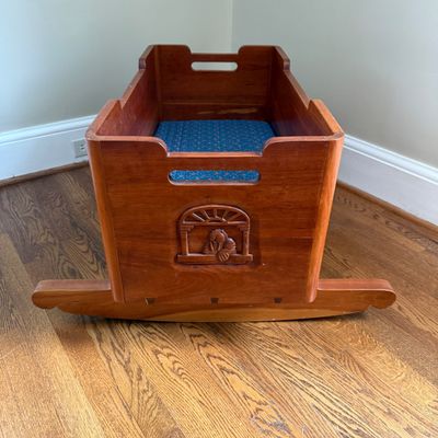 Wooden Rocking Doll Cradle with Carved Walrus Detail