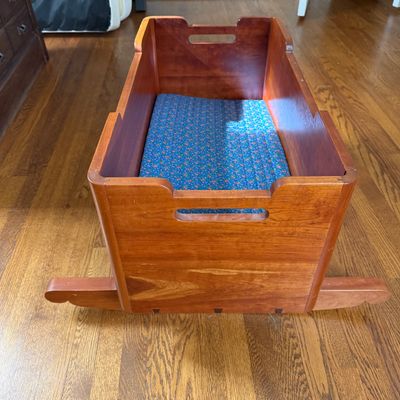 Wooden Rocking Doll Cradle with Carved Walrus Detail