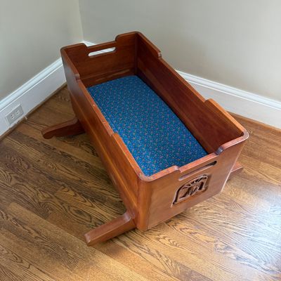 Wooden Rocking Doll Cradle with Carved Walrus Detail