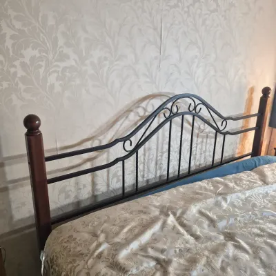LOT 24W: King Size Headboard with Wooden Posts & Metal Scrollwork