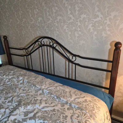 LOT 24W: King Size Headboard with Wooden Posts & Metal Scrollwork