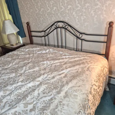 LOT 24W: King Size Headboard with Wooden Posts & Metal Scrollwork