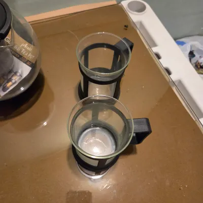 Sale Photo Thumbnail #402: Glass and plastic tea steeper and 4 cups. New