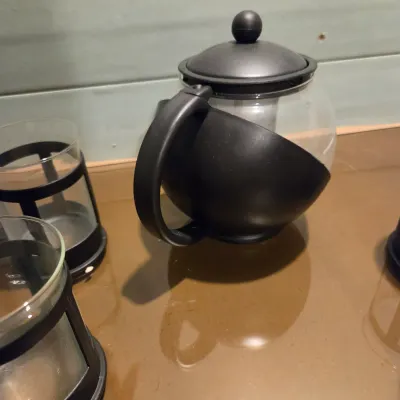 Sale Photo Thumbnail #404: Glass and plastic tea steeper and 4 cups. New