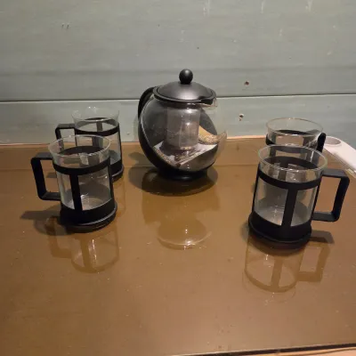 Sale Photo Thumbnail #400: Glass and plastic tea steeper and 4 cups. New