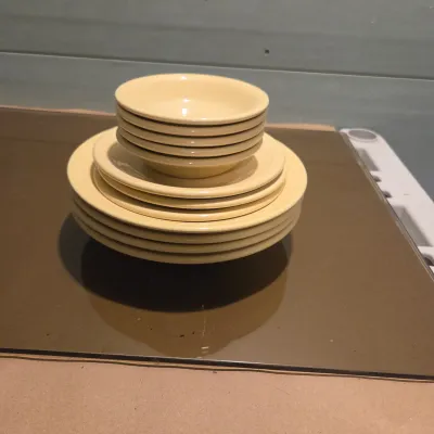 Sale Photo Thumbnail #229: 4 Flanged Bowls, 3 dessert plates, 5 berry bowls - Fiesta Yellow