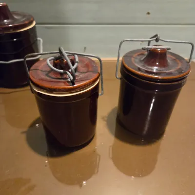 Sale Photo Thumbnail #440: 6 Cheese Crocks with lids and latches. On is missing the latch piece