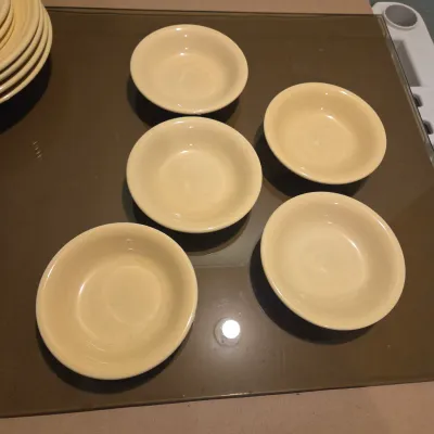 Sale Photo Thumbnail #237: 4 Flanged Bowls, 3 dessert plates, 5 berry bowls - Fiesta Yellow