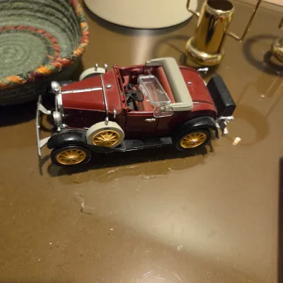 Little model cars, and a couple other items. strange lot, sorry!