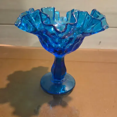 Sale Photo Thumbnail #339: Old Black satin advertising piece, moonstone goblet, Fenton french opalescent vase and a gorgeous turquoise Fenton Thumbprint Compote