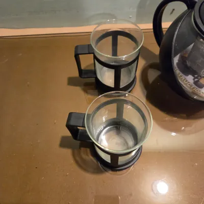 Sale Photo Thumbnail #401: Glass and plastic tea steeper and 4 cups. New