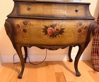 Sale Photo Thumbnail #8: Vintage French provincial style bombe chest with a crackle finish, hand-painted floral motifs, and cabriole legs.