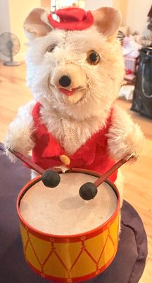 Sale Photo Thumbnail #4: Vintage mid-century wind-up drumming bear toy, featuring white plush fur, a red felt vest and hat, and a lithographed tin drum.