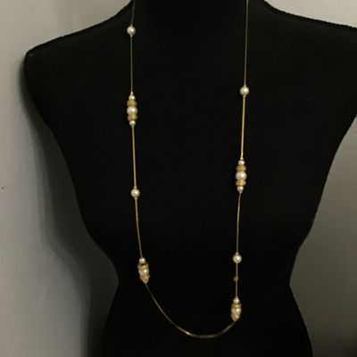 Sale Photo Thumbnail #98: Long vintage opera-length station necklace featuring a gold-tone snake chain interspersed with clusters of faux pearl beads and textured, gold-tone accent spacers. Good condition with light vintage wear. Perfect for layering or wearing single/double wrapp