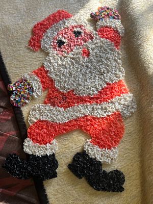 Vintage handmade tissue or ribbon art Santa Claus wall hanging, featuring textured red, white, black, and multicolored detailing on a...