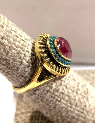**NEW ARRIVAL** Size 7 RED TEARDROP Center Stone RING with Small GREEN "Globes' Surround + Gold & Black Color Setting on a...