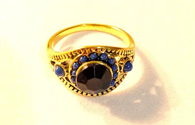 **NEW ARRIVAL** Size 9¾ BLACK ROUND Center Stone RING with Small BLUE "Globes' Surround + Gold & Black Color Setting on a...