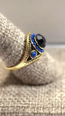 **NEW ARRIVAL** Size 9¾ BLACK ROUND Center Stone RING with Small BLUE "Globes' Surround + Gold & Black Color Setting on a...