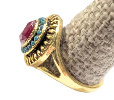 **NEW ARRIVAL** Size 7 RED TEARDROP Center Stone RING with Small GREEN "Globes' Surround + Gold & Black Color Setting on a...