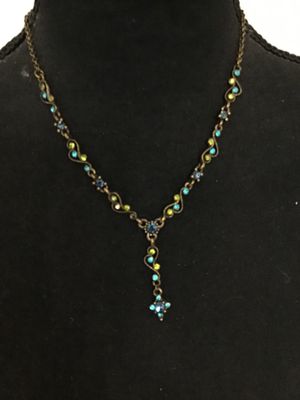 Sale Photo Thumbnail #24: Antiqued brass-tone Y-drop necklace set with blue, teal, and lime green rhinestones in delicate filigree scroll links. Features a lobster claw clasp with an adjustable extender chain. Good pre-owned condition with all stones intact.