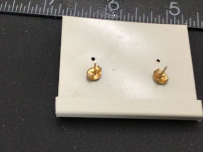 Sale Photo Thumbnail #203: Pair of vintage cloisonne post earrings featuring a tulip vase motif with colorful tulips and blue butterflies on a white background with gold-tone accents. Mounted on original display card marked 'Genuine Cloisonne'. Pierced stud style backings.