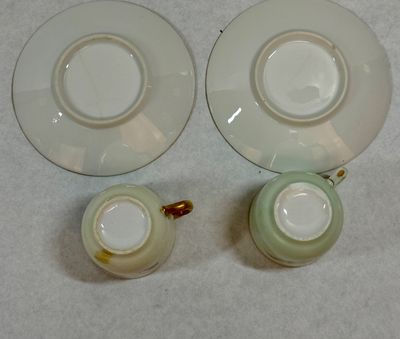 Pair of Vintage Hand-Painted Porcelain Demitasse Cups and Saucers