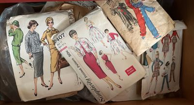 Sale Photo Thumbnail #149: Collection of vintage 1950s and 1960s sewing patterns, including McCall's and Simplicity dress and costume designs.