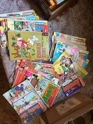 Sale Photo Thumbnail #9: Large collection of vintage comic books featuring Archie Comics and Disney's Uncle Scrooge, primarily from the 1970s.
