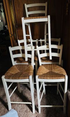 Sale Photo Thumbnail #89: Set of modern white painted ladder-back bar stools with woven rush seats.